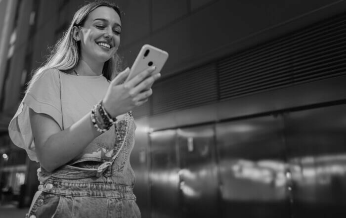 girl checking social media on phone